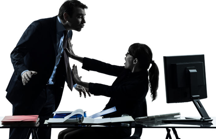 One  Business Woman Man Couple Sexual Harassment In Silhouette Studio Isolated On White Background